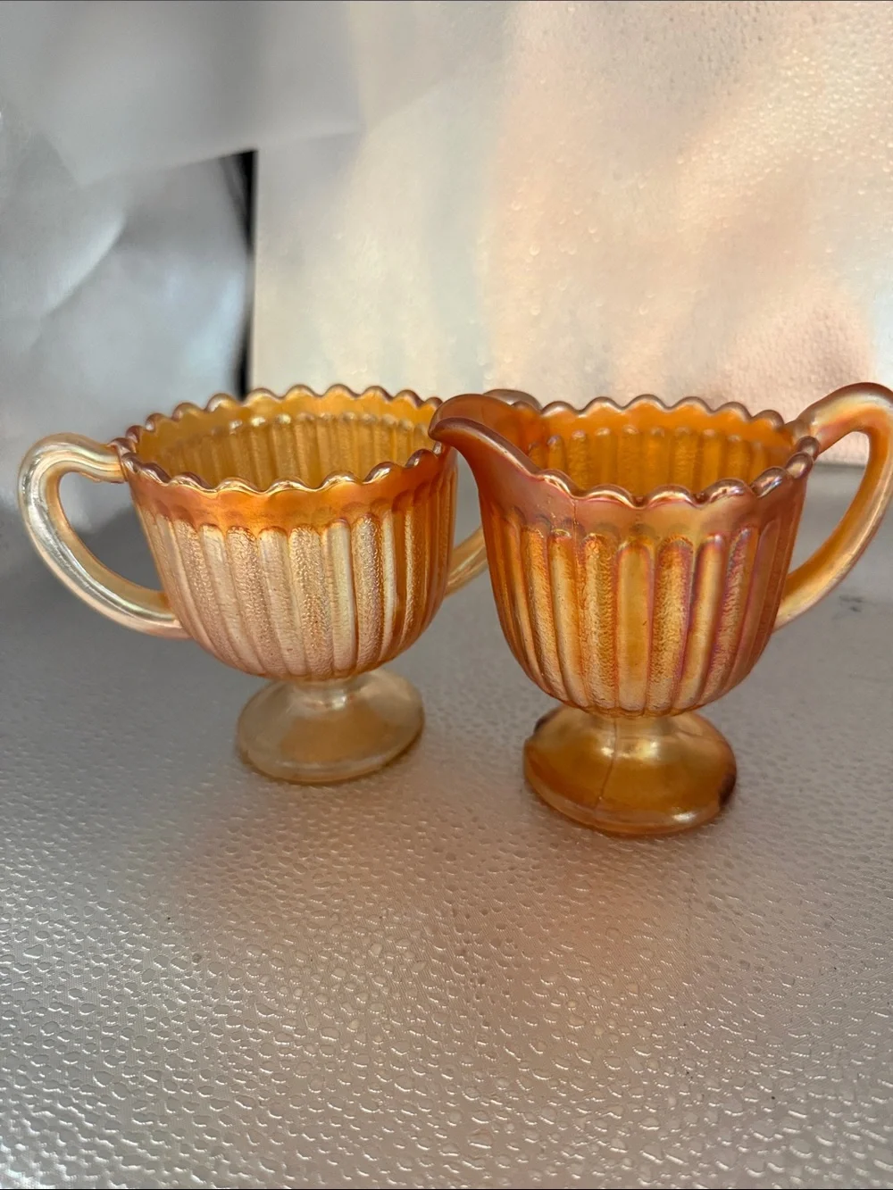 Vintage “Striped Rays” Carnival Glass sugar and creamer set.